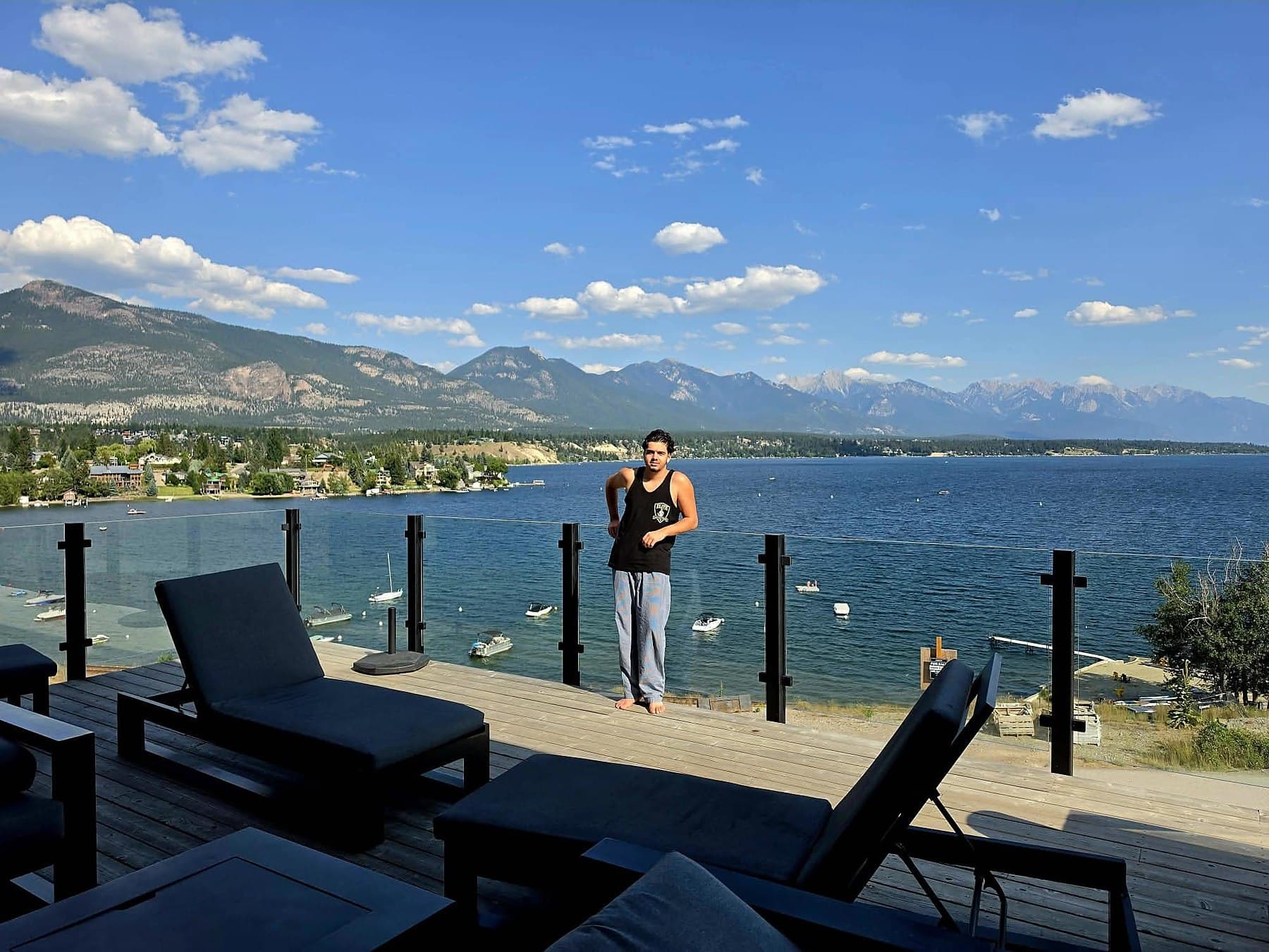 Noa Assaf on a lakeside deck